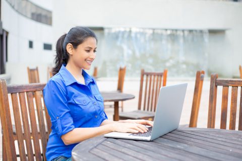 woman using her laptop